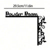 Black metal wall decor featuring a decorative floral design and the text Powder Room.