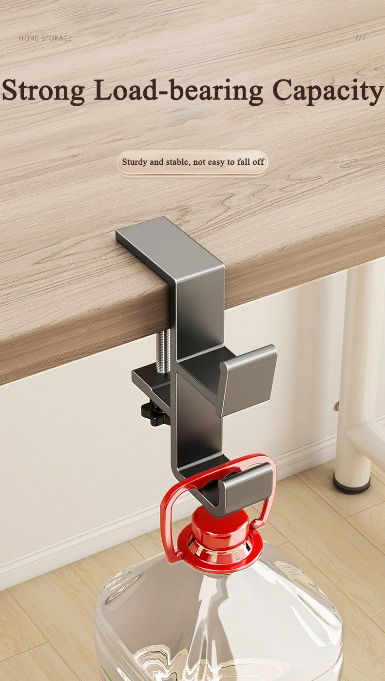 A close-up of a sturdy metal desk hook with a red handle, designed for load-bearing capacity.