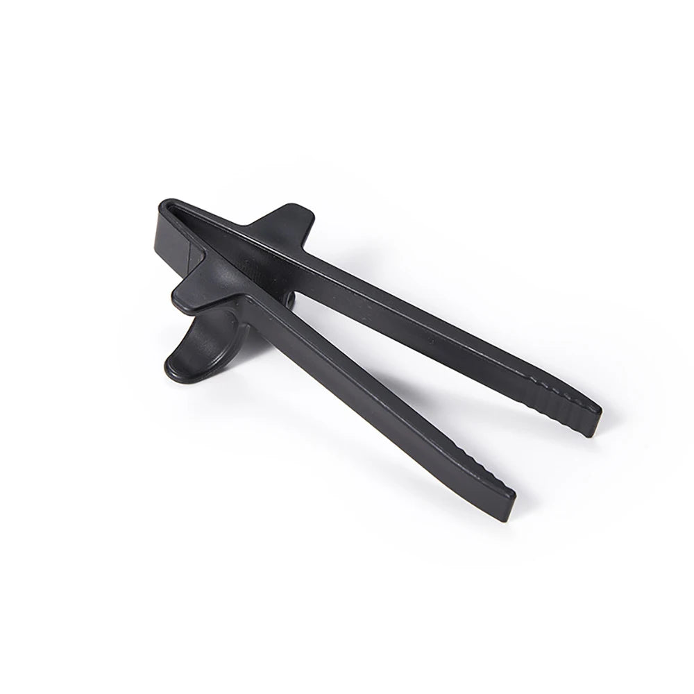 A pair of black reusable wheat straw finger chopsticks shown against a white background.