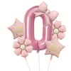 Pink foil number zero balloon decorated with pink bows and flowers for a birthday celebration