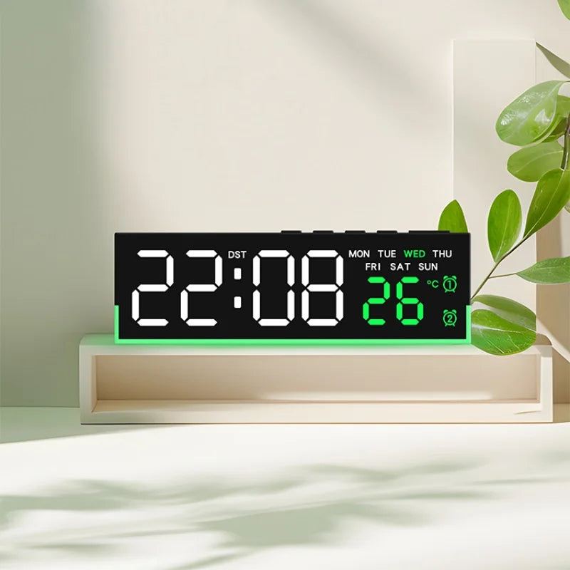 A digital LED alarm clock displaying the time 22:08 and temperature 26 degrees on a wooden shelf.