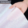 A hand is holding a piece of elegant white sparkling wedding aisle runner fabric.