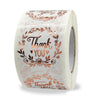 Roll of gold foil thank you sealing stickers with floral designs for envelopes and gifts