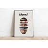 A black and white canvas print featuring the word blond above a series of close-up portraits.
