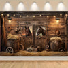 A rustic wooden barn door background featuring antique leather goods, hay bales, and vintage tools.