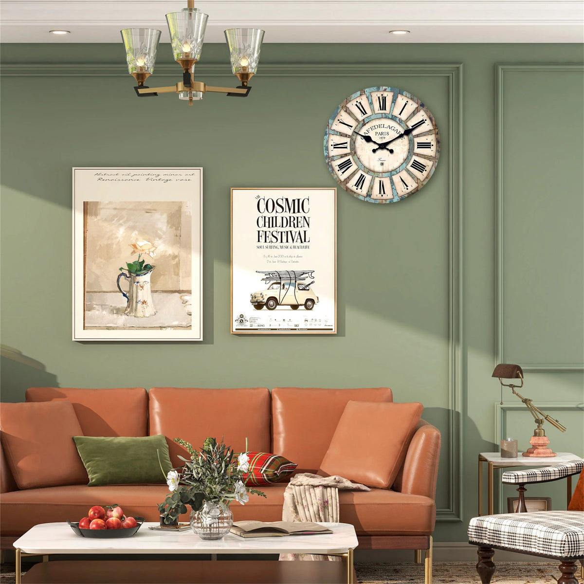 A rustic wooden wall clock with a distressed white face hangs on a sage green wall above a brown sofa.