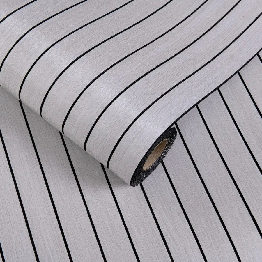 Roll of self-adhesive 3D wood grain wall panels showing vertical lines on a light gray background.
