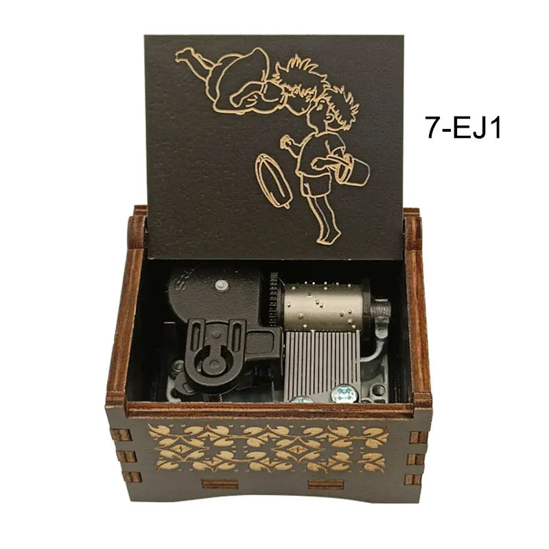 A dark wooden box containing a music melody box with a character design on the lid.