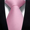 A pink silk necktie tied in a knot against a black suit jacket.