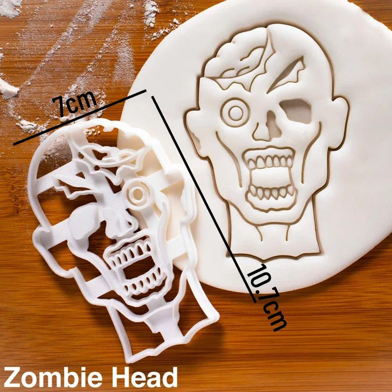 A white cookie cutter and fondant stamp set showing a zombie head design with measurements.