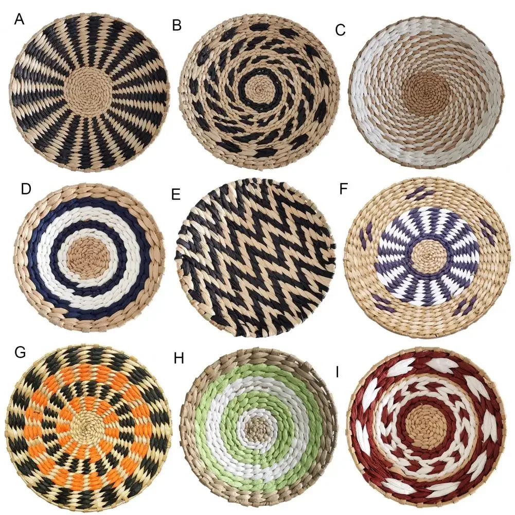 Nine woven straw wall decor hangings in various geometric patterns and natural tones.