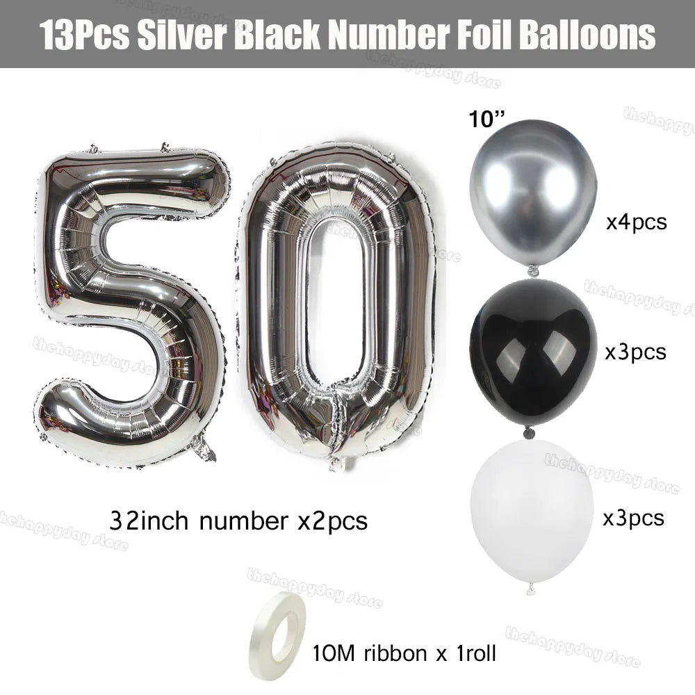 Silver and black number foil balloons including 50, 10, and 32 inch numbers with ribbon
