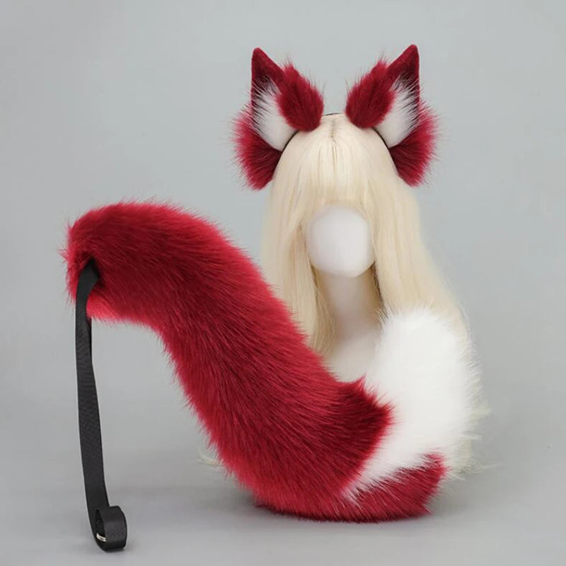 A white mannequin displays a faux fur fox tail and ear costume set in shades of red and white.
