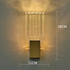 Modern bubble crystal LED wall sconces featuring a rectangular light fixture and a square base.