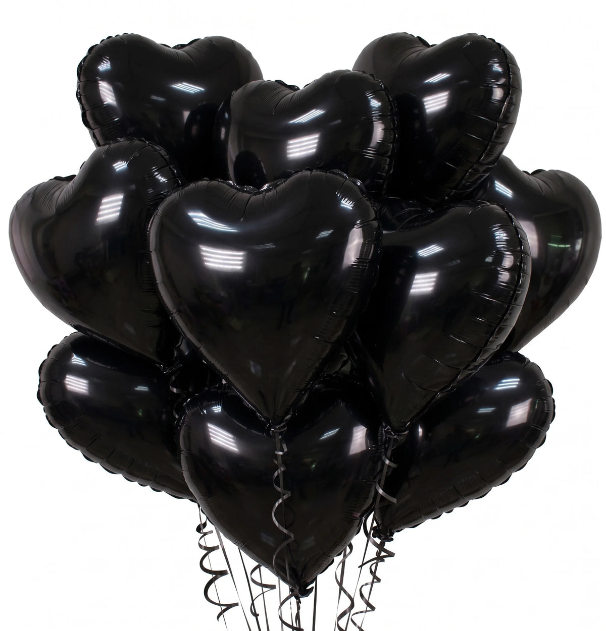 A bunch of black heart-shaped foil balloons tied together.