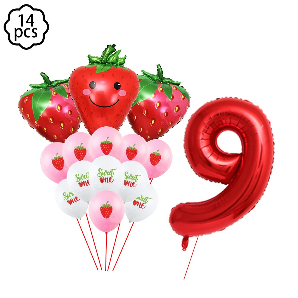 A kit of strawberry-themed party supplies including strawberries, balloons, and a red number nine foil balloon.