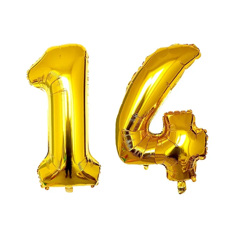 Gold foil number balloons shaped like the number 14 for a birthday party