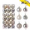 A set of 36 festive Christmas baubles in various silver and gold tones for holiday decor.