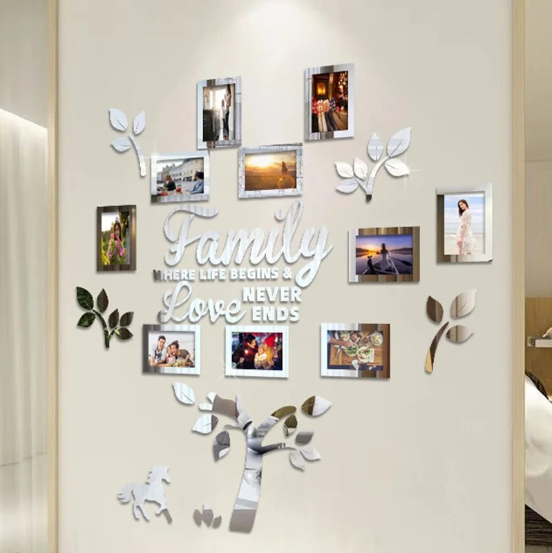 A wall collage featuring framed photos and leaves arranged in a family tree design.