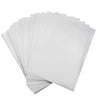 A stack of white A4 edible wafer paper sheets for cake decorating.