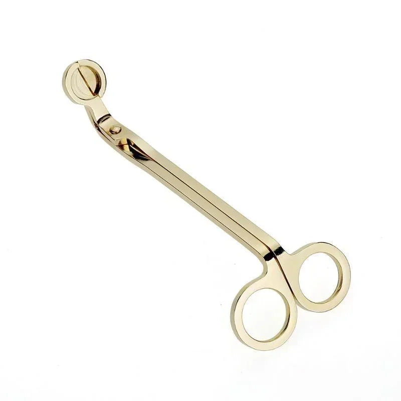 A pair of stainless steel candle wick trimmer scissors with a small trimming tool.