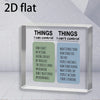 A clear acrylic desk sign titled Things I Can Control and Things I Can't Control with various life aspects listed.