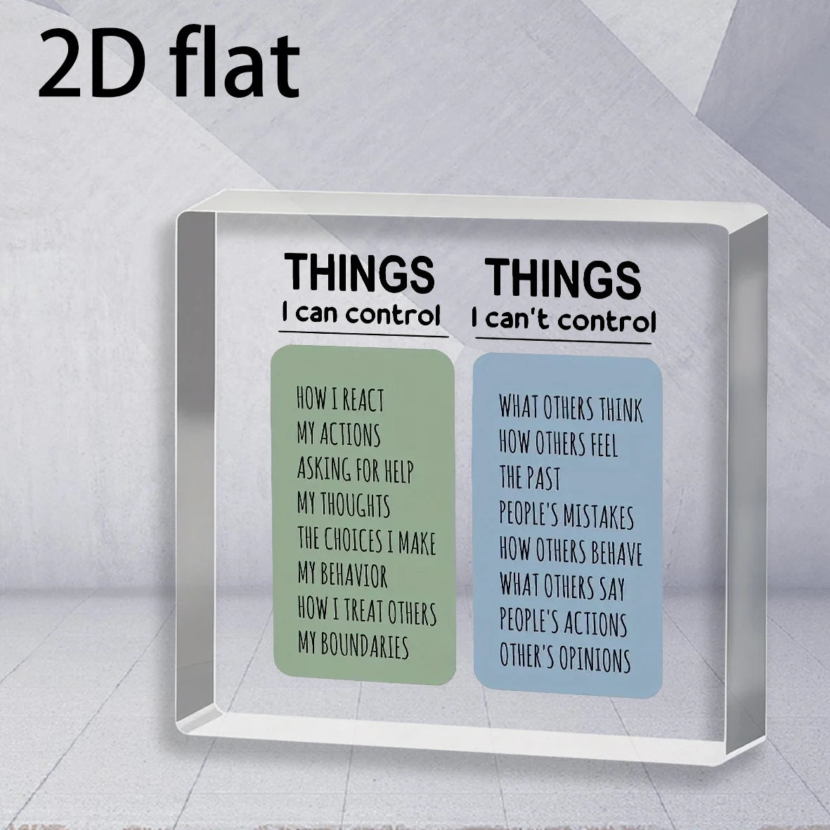 A clear acrylic desk sign titled Things I Can Control and Things I Can't Control with various life aspects listed.