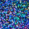 A close-up shot of colorful LED string lights with blue background and dark wires.