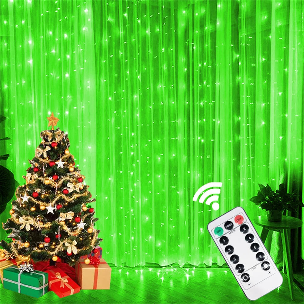 Christmas tree decorated with lights and gifts in front of a bright green curtain with string lights.