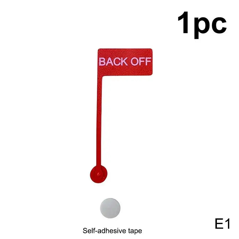 A red back off indicator sign with a stick and ball, packaged as one piece.