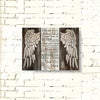 Wooden wall art featuring a silhouette of wings and inspirational text on a rustic wooden background