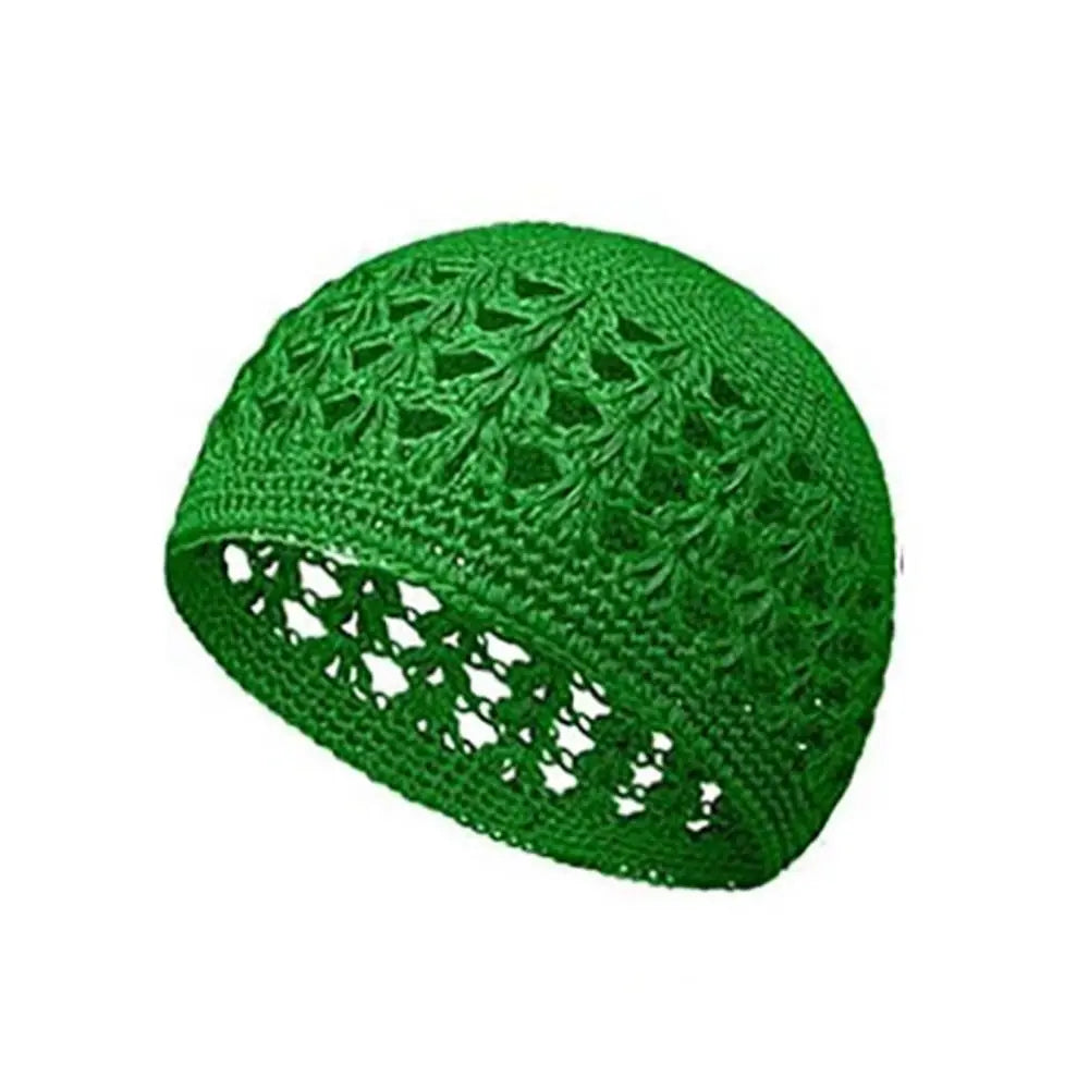 A handmade crochet beanie hat in vibrant green with an openwork pattern.