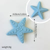 Light blue star-shaped cake topper with a textured surface, shown next to a measurement guide.