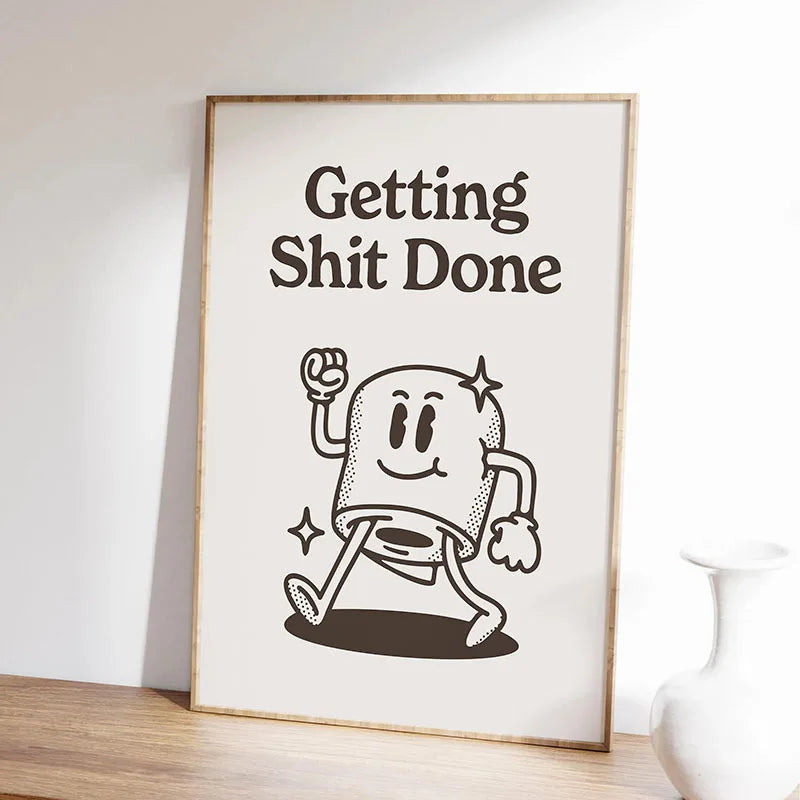 A framed black and white line drawing quote that reads Getting Shit Done on a light background.