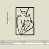 Black metal wall art featuring a minimalist silhouette of a cat and a woman's face.