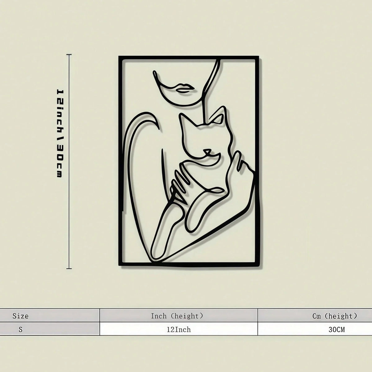 Black metal wall art featuring a minimalist silhouette of a cat and a woman's face.