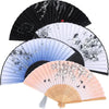 A collection of vintage bamboo folding hand fans in black, white, and pink tones.