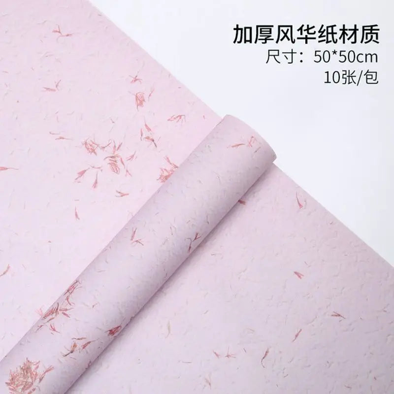 Roll of pink flower petal decorative packaging paper for gifts and weddings