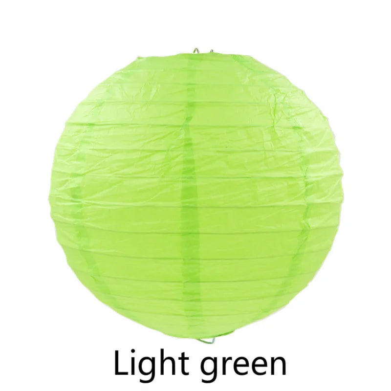 A round, lime green decorative paper lantern.