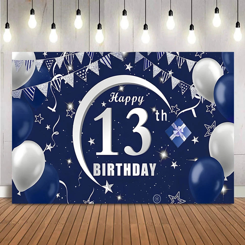 A dark blue party backdrop featuring a large silver crescent moon and the text Happy 13th Birthday surrounded by stars and bu