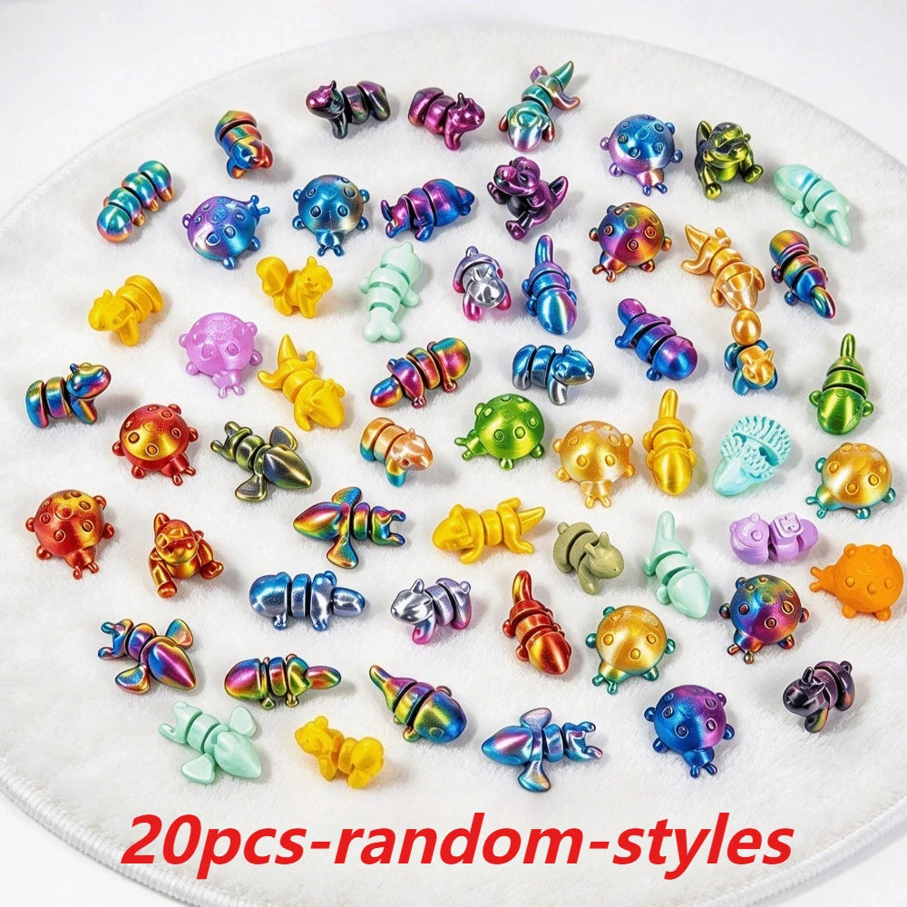 A collection of 20 random-style 3D printed articulated animal figurines in various colors and shapes.