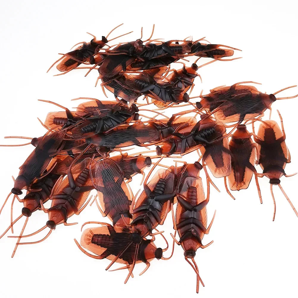 A realistic plastic bug set featuring cockroaches, centipedes, and scorpions for Halloween pranks.