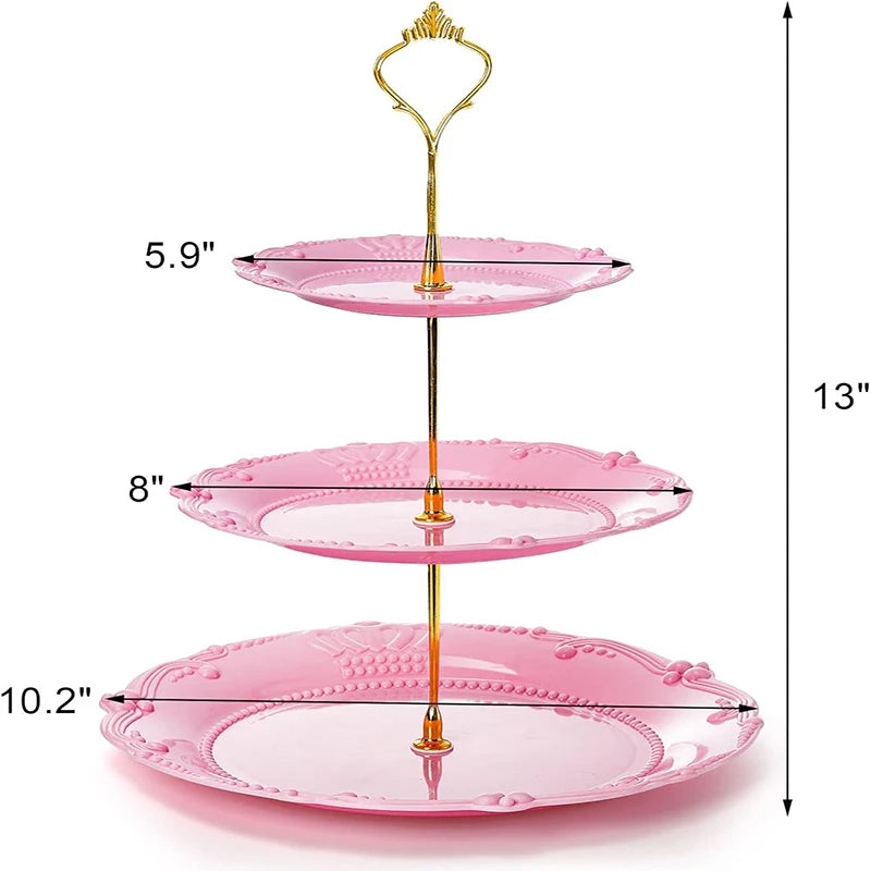 A three-tier pink plastic cupcake stand with gold accents, showing various sizes.