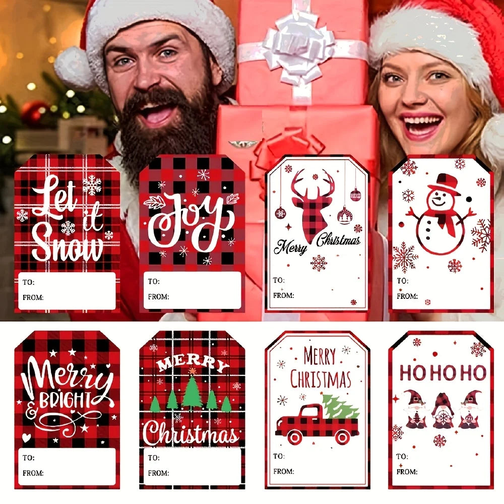 A woman and a man smiling while holding a roll of Christmas present stickers