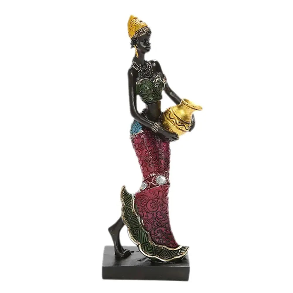 Hand-painted resin statue of an African tribal lady with gold crown and jewelry.