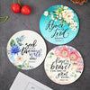 Set of six wooden bible verse coasters featuring floral designs and scripture verses