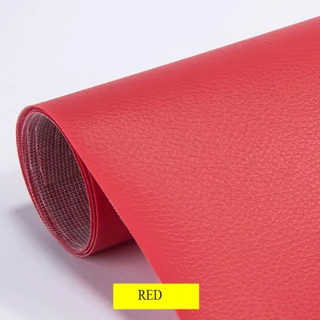 A roll of red self-adhesive PU leather furniture repair patches.