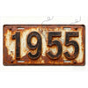A vintage style aluminum license plate with the year 1955 embossed on it, showing signs of rust and weathering.