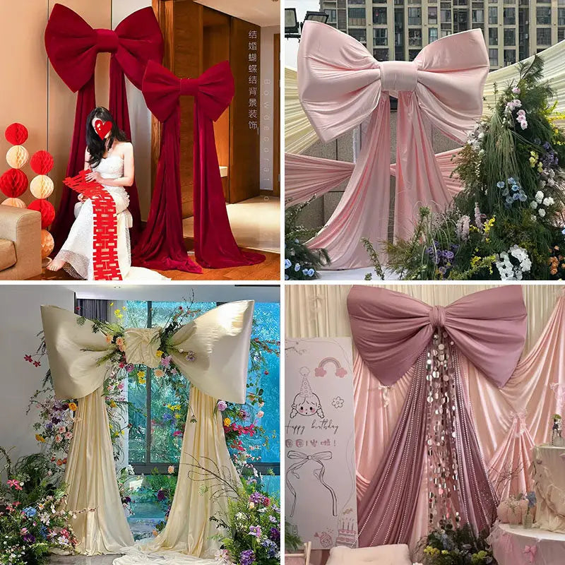 Pink and red satin bow with long tulle drape for event decor