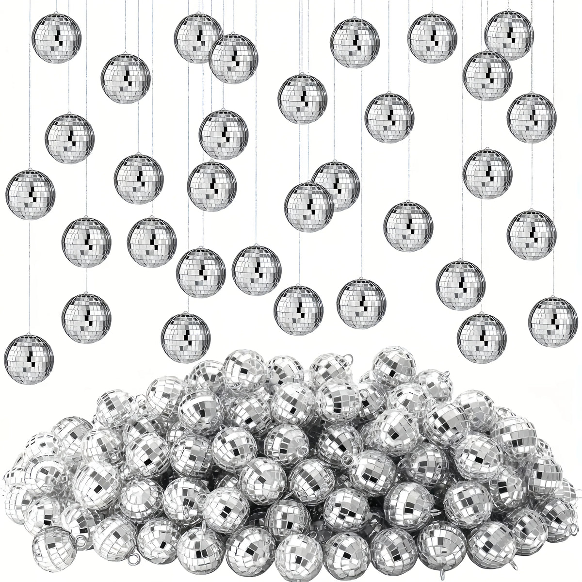 A large pile of silver mini disco mirror balls with strings hanging above them.